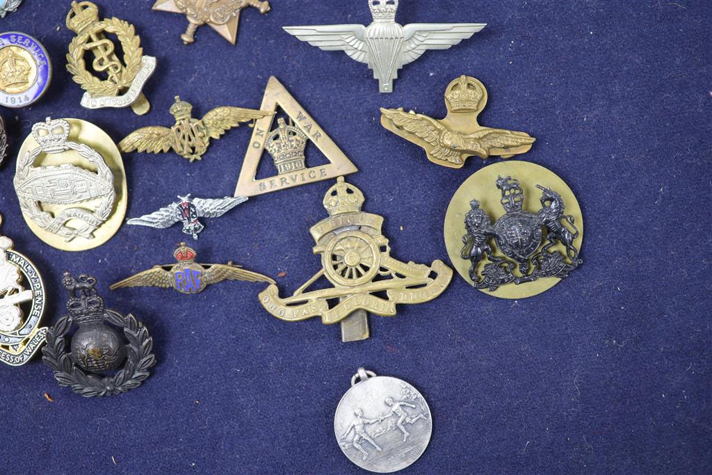 A quantity of Military and Civilian medals / badges